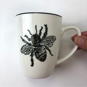 Abbott white ceramic Bee mug